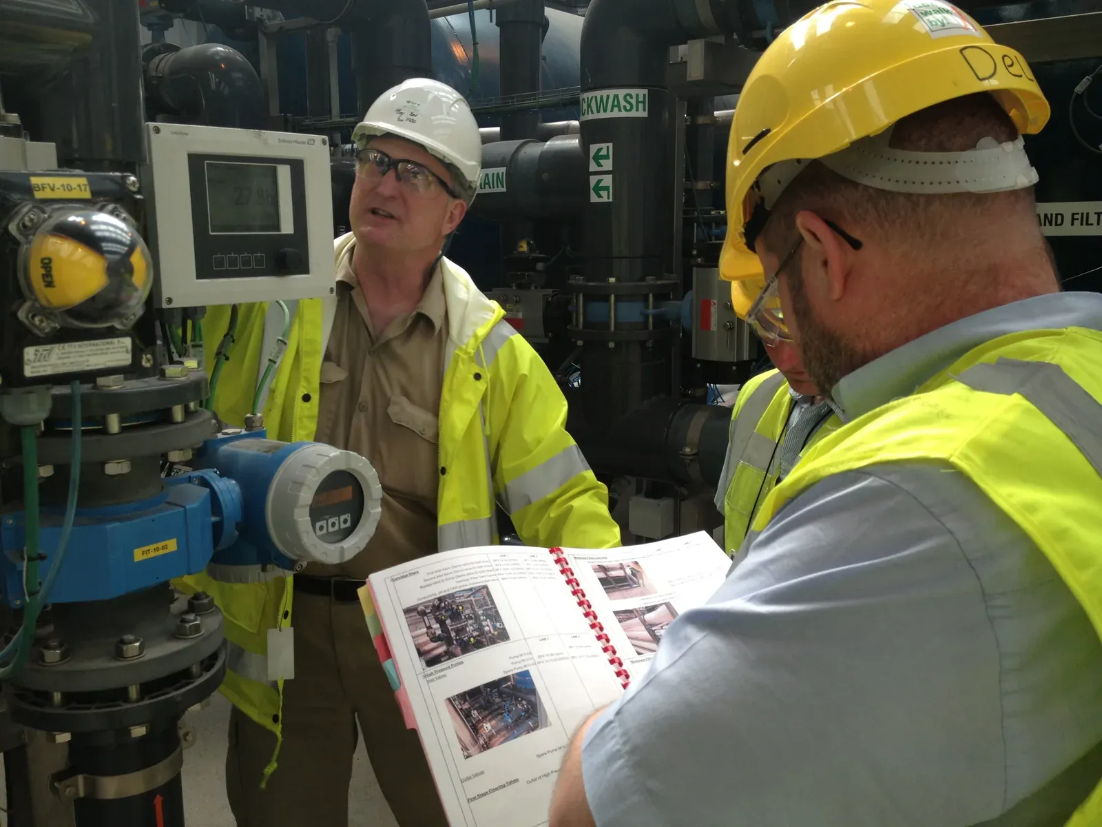 John reviewing the treatment process on site with the plant team