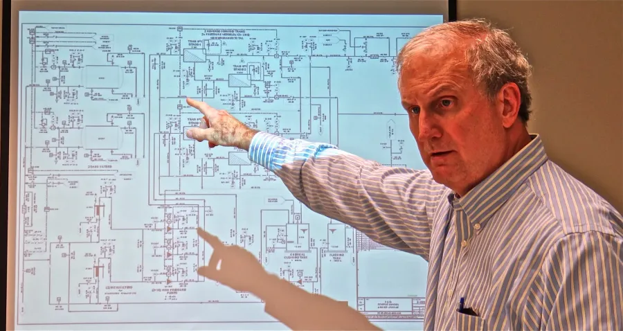 Process and equipment design for an industrial treatment system